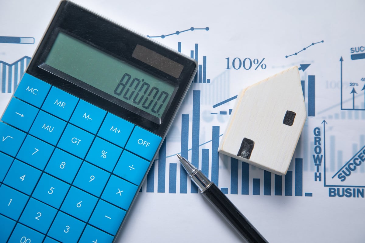 Calculatrice financière avec modèle de maison et graphiques hypothécaires au Québec - inscripteur.com